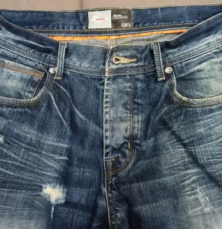 Pantalones vaqueros desgastados azules