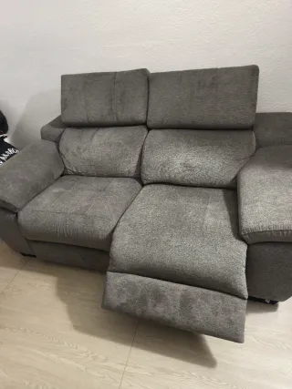 Sofá eléctrico gris de tela