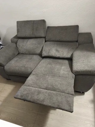 Sofá eléctrico gris de tela