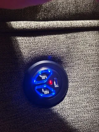 Sofá eléctrico gris de tela