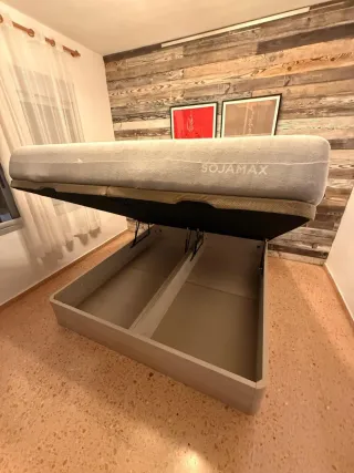 Canapé abatible con cabecero tapizado