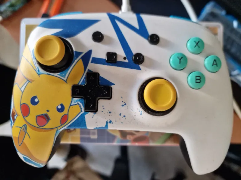 Nintendo Switch V1 + 15 Juegos + Mando Pikachu afbeelding 3