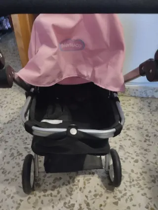 Carrito de muñecas rosa