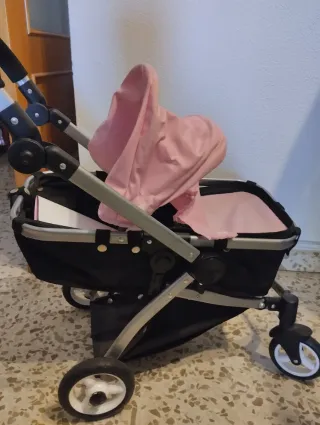 Carrito de muñecas rosa