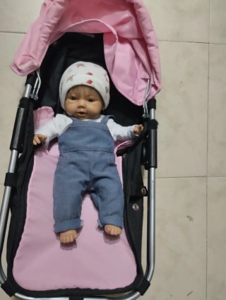 Carrito de muñecas rosa