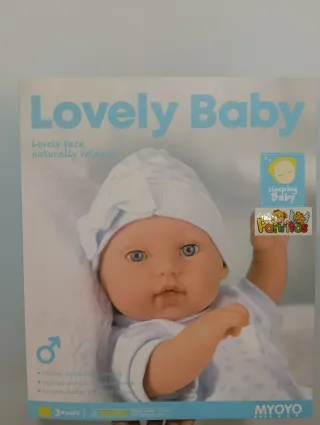 Muñeco bebé con manta