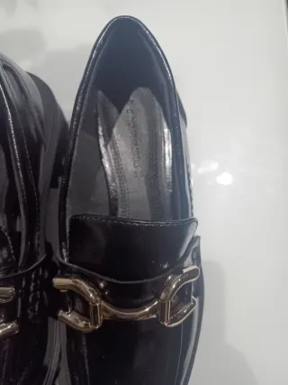 Zapatos negros con hebilla
