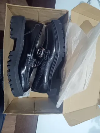 Zapatos negros con hebilla