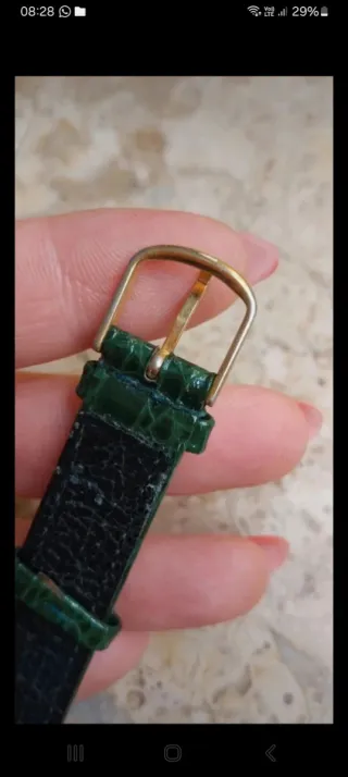 Orologio vintage con cinturino in pelle verde