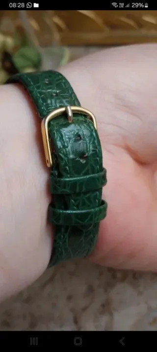 Orologio vintage con cinturino in pelle verde