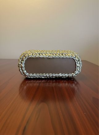 Borsa clutch uncinetto oro