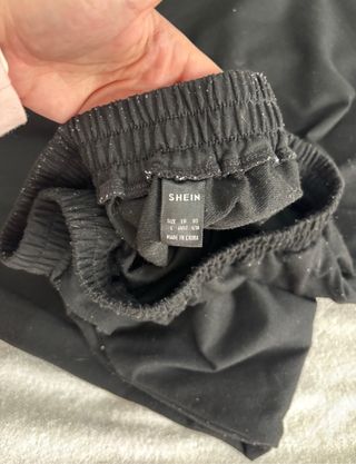 Pantalón chándal negro bombacho puños en piernas