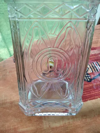 Botella antigua vintage con dispensador