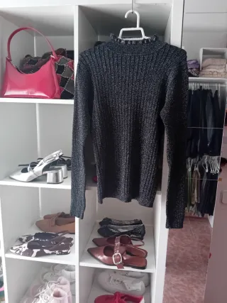 Jersey brillante con cuello