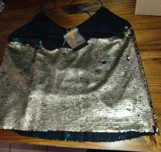 Top lentejuelas Stradivarius negro y dorado