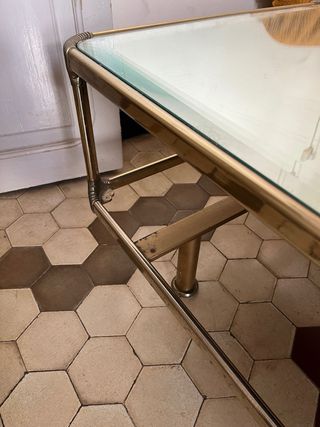 Mesa de centro cristal y metal dorado