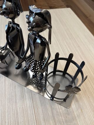 Portabottiglie artistico in metallo