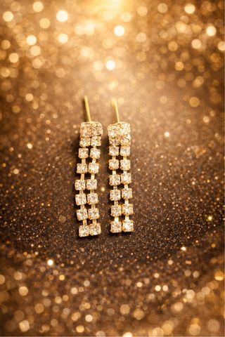 Pendientes largos dorados con brillantes