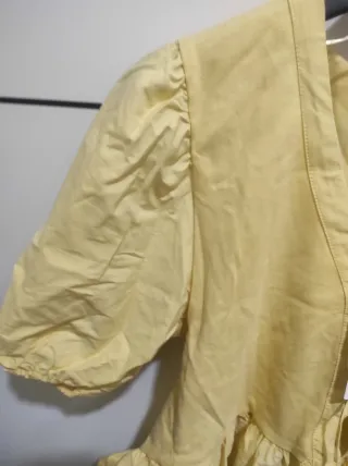 Blusa amarilla manga corta talla M