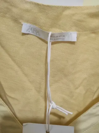 Blusa amarilla manga corta talla M