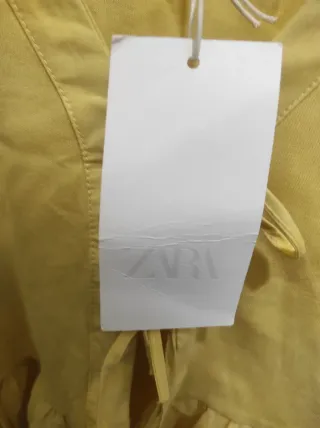 Blusa amarilla manga corta talla M