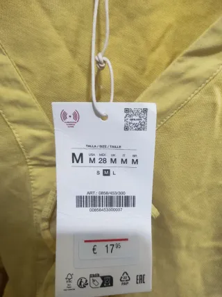 Blusa amarilla manga corta talla M