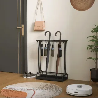 Paragüero metal moderno de acero con recoge gotas