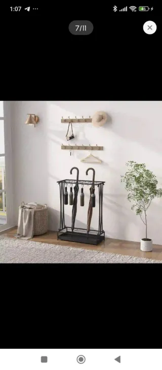 Paragüero metal moderno de acero con recoge gotas