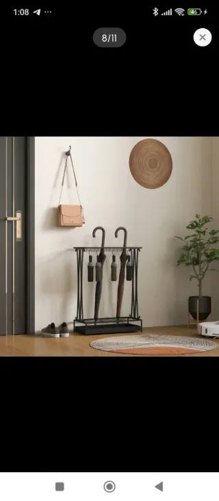 Paragüero metal moderno de acero con recoge gotas