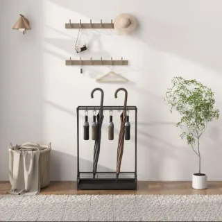 Paragüero metal moderno de acero con recoge gotas