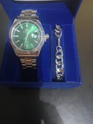 Reloj y pulsera de acero