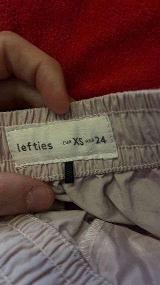 Pantalones beige anchos (tiran a color rosa)