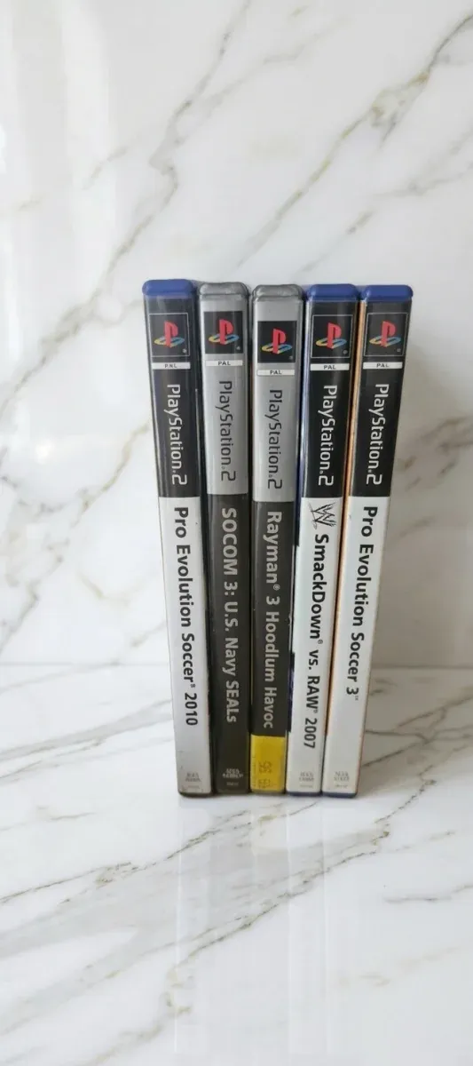 Paquete de 5 juegos PS2: Pro Evolution, SOCOM, Rayman, WWE y más