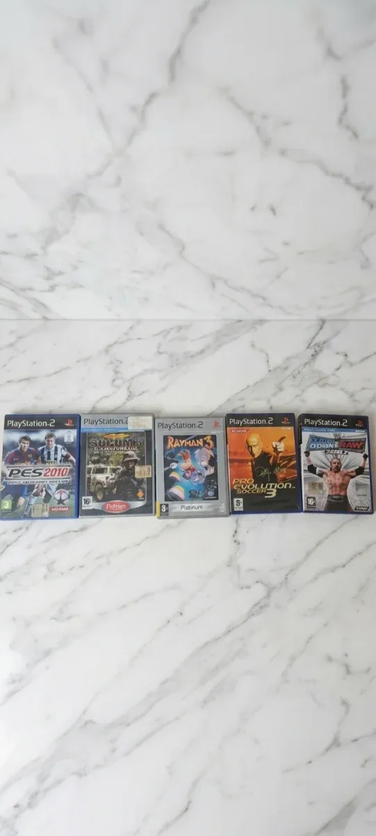 Paquete de 5 juegos PS2: Pro Evolution, SOCOM, Rayman, WWE y más afbeelding 2