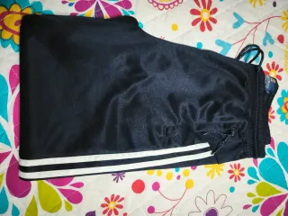Pantalón de chándal negro con rayas blancas