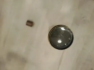 Catalejo de metal con funda de cuero