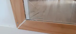 Espejo Montessori madera con juguetes