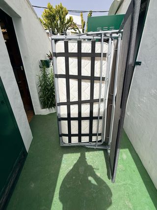 Sofá cama gris tela en excelente condicion