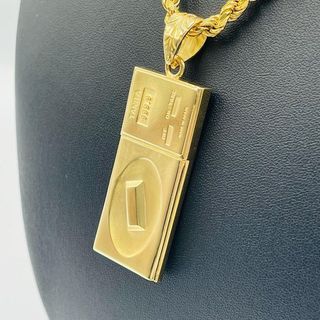 COLGANTE BASCULA TANITA HUECO. Oro 18k.