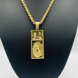 COLGANTE BASCULA TANITA HUECO. Oro 18k.