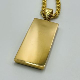 COLGANTE BASCULA TANITA HUECO. Oro 18k.