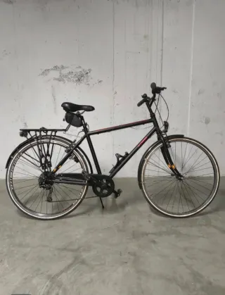 Bicicleta híbrida B’Twin Trekking Shimano Deore 28