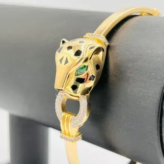 Pulsera rígida pantera con circonitas 18k