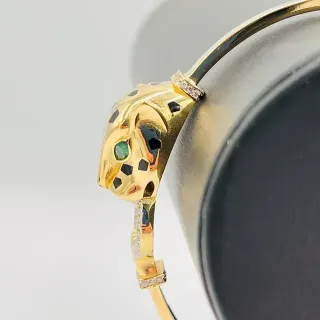 Pulsera rígida pantera con circonitas 18k