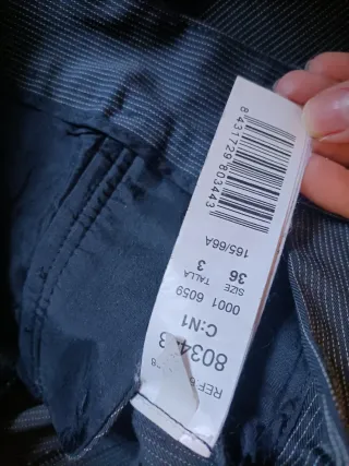 Pantalones de traje Mango grises talla 36