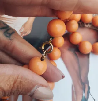 Collane vintage perle arancioni e beige