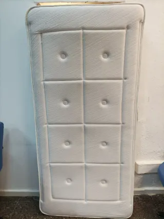 Cama con colchón
