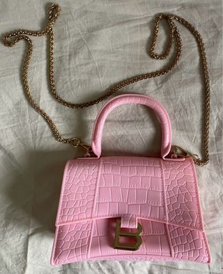 Borsa Balenciaga rosa chiaro con logo dorato