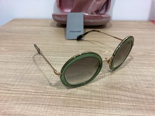 Gafas de sol Miu Miu redondas verdes