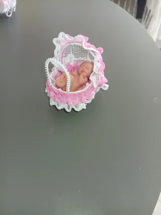 Carrito de bebé con muñeco